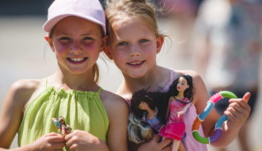 Two girls with toys